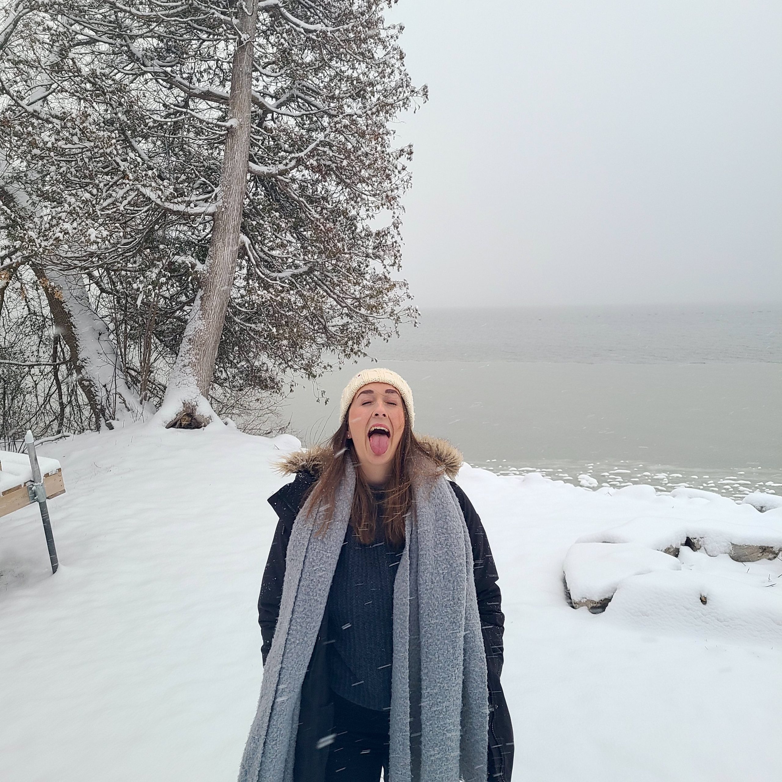 Photo of Kate catching snowfall with her tongue